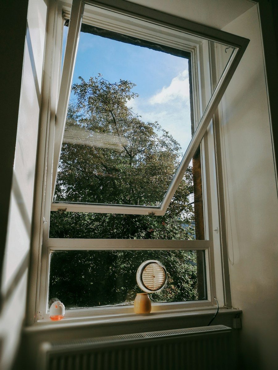 white wooden framed glass window