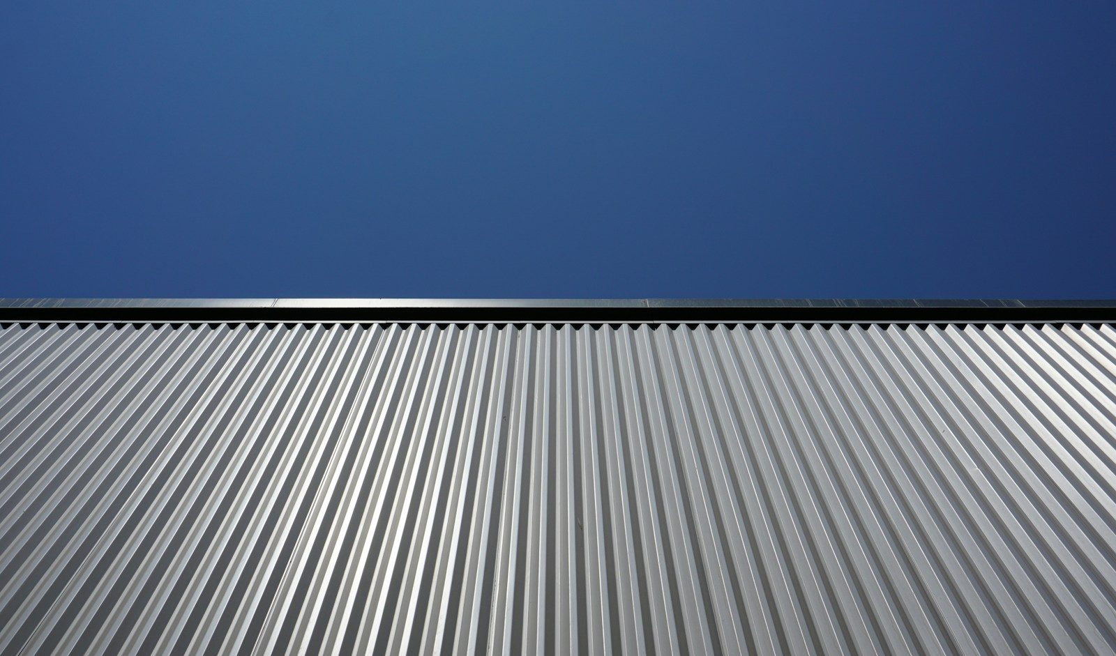 High Quality Roofing Services in Reidsville: white and black striped textile